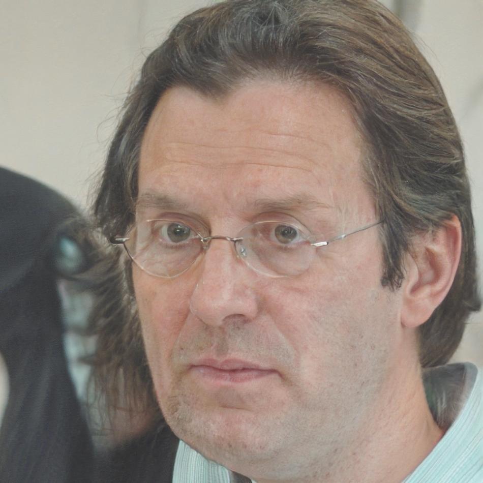 Professional headshot of financial planning instructor